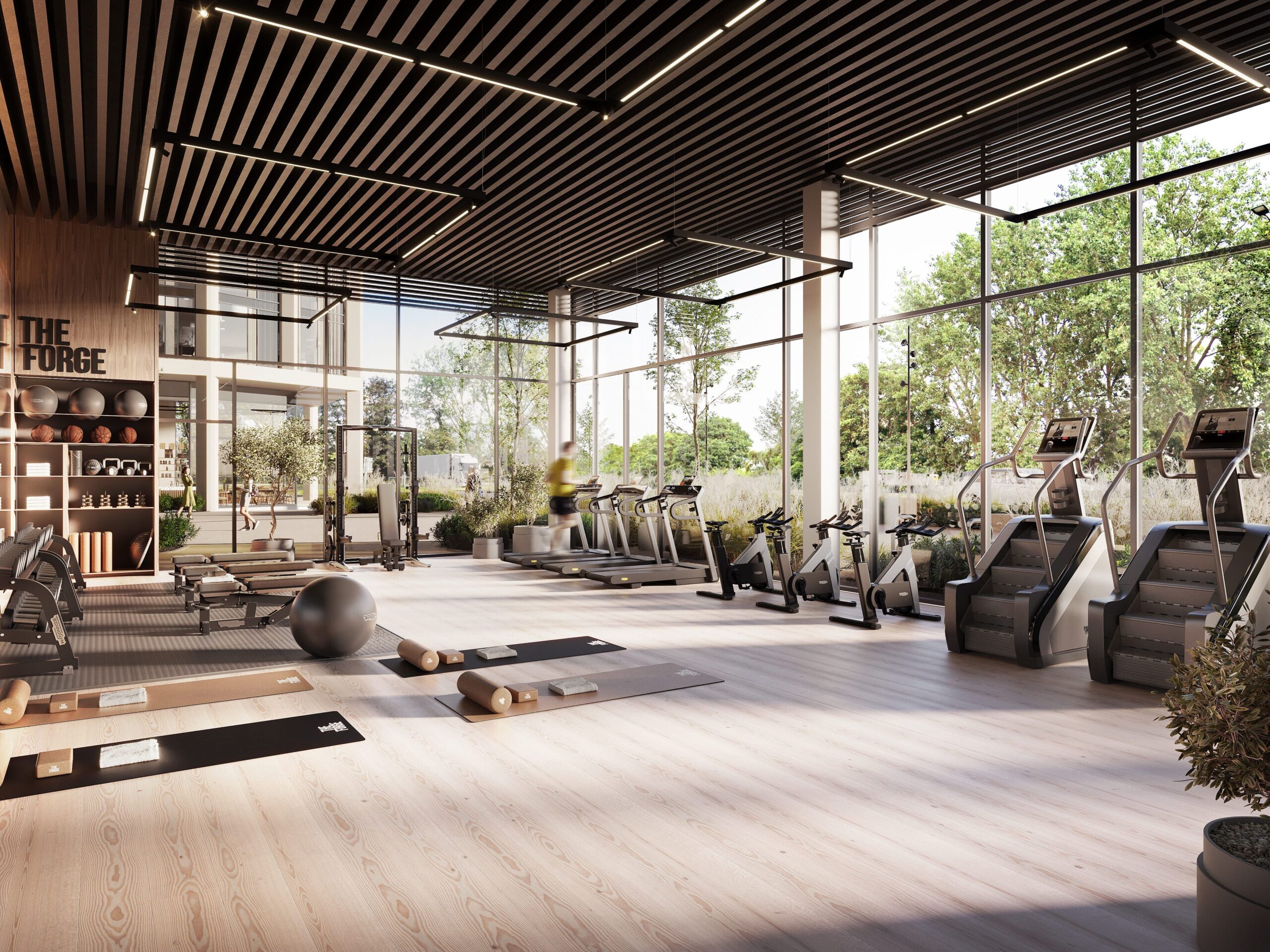 Interior CGI of The Forge residents’ gym with cardio equipment, strength training areas and floor-to-ceiling windows.