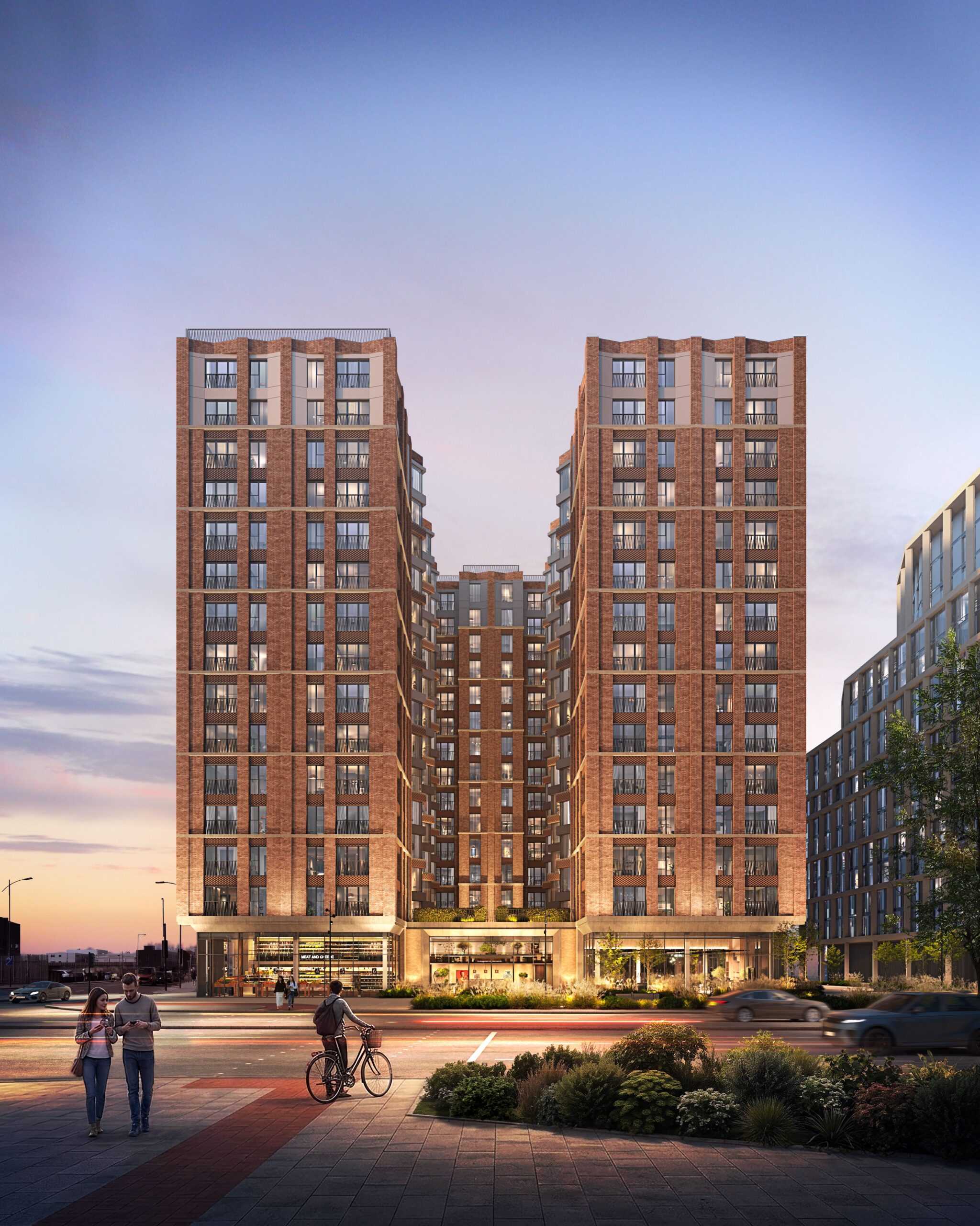 Exterior CGI of The Forge in Liverpool, showing the red-brick residential towers from a landscaped city street.