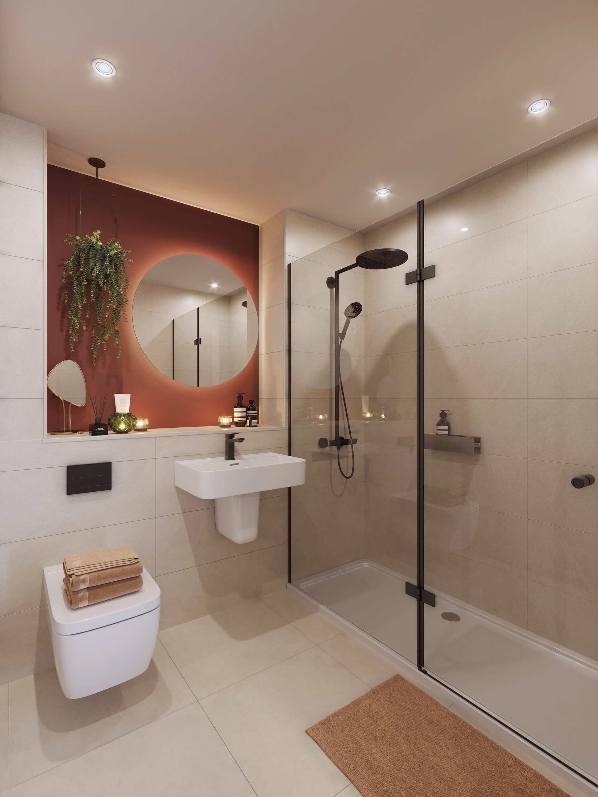 Interior architectural CGI of an apartment bathroom at Abbey Row in Liverpool, featuring neutral tiling, a glass-enclosed shower, black fittings and a terracotta feature wall with circular mirror.