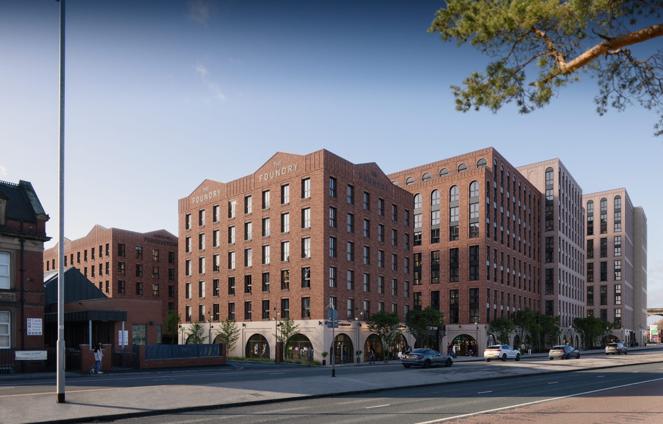 Exterior CGI of New Foundry Square in Leeds, showing the red-brick residential development and ground-floor commercial spaces along Kirkstall Road.