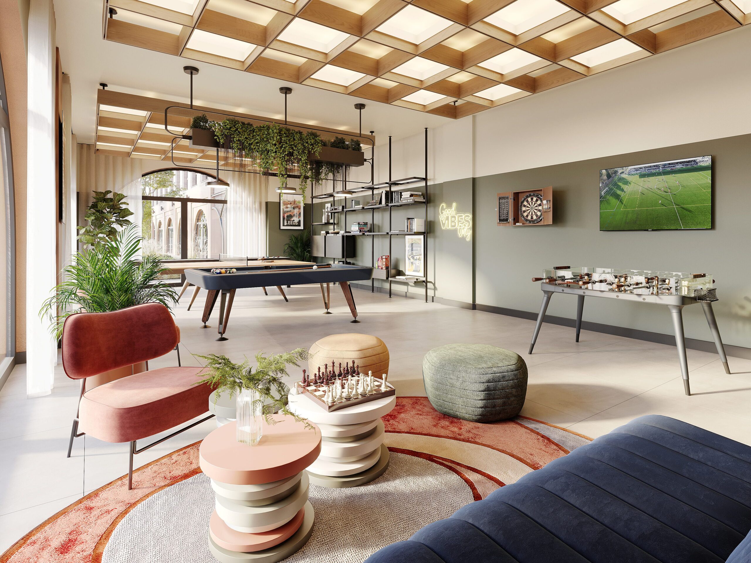 Interior CGI of the residents’ games room at New Foundry Square in Leeds, featuring pool and foosball tables, lounge seating and indoor planting.